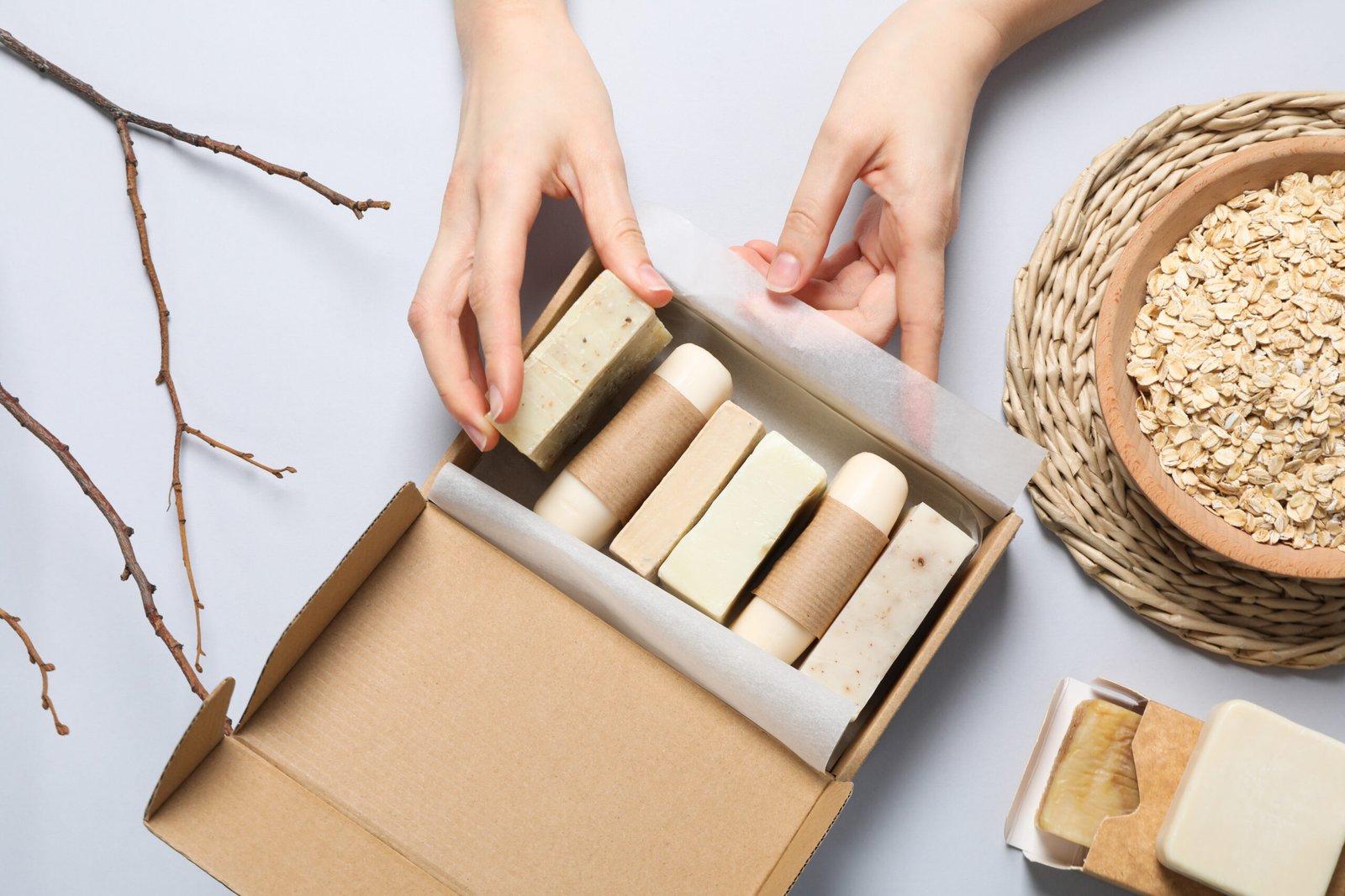 Natural handmade soap with ingredients, on a light background.